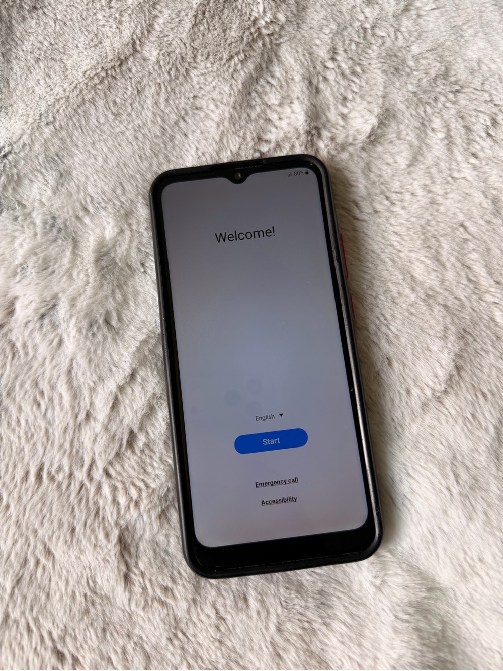 Samsung Black Smartphone with Blue Start Screen